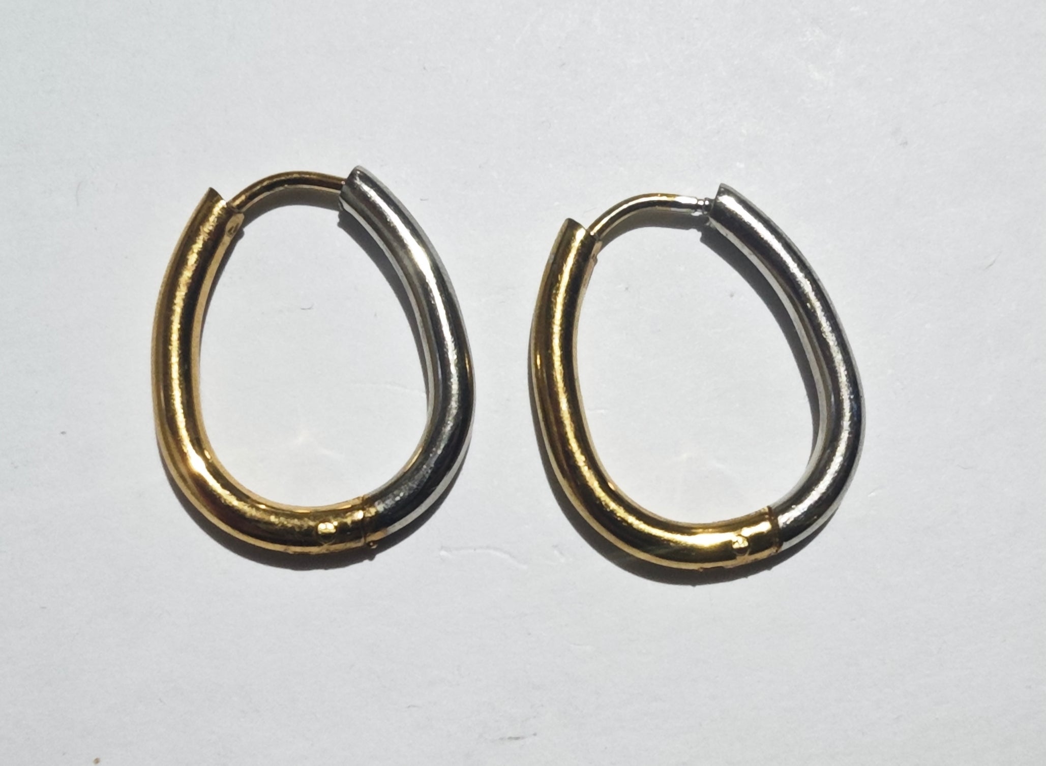 Arracada oval combinada