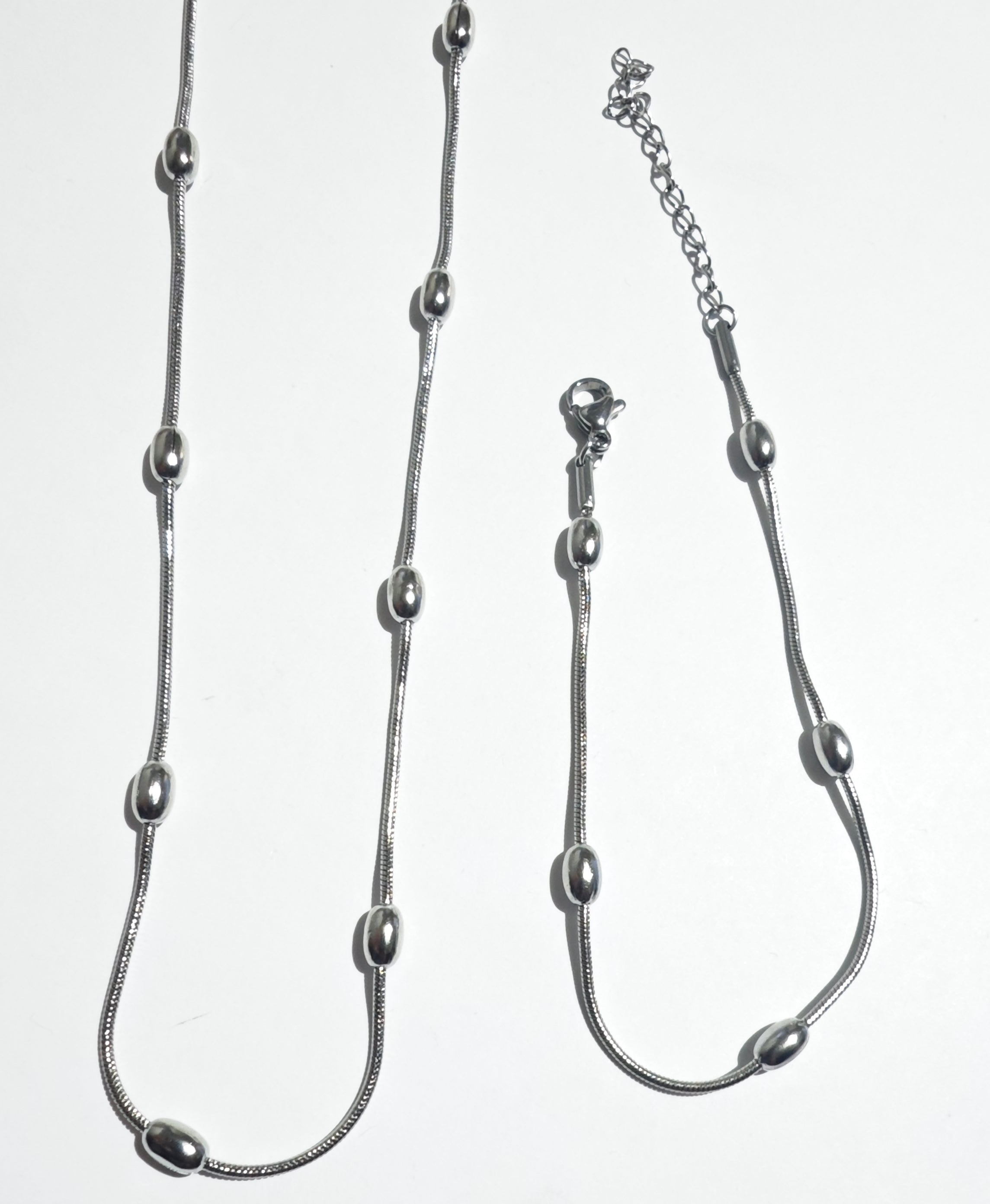 Conjunto puntos plateado