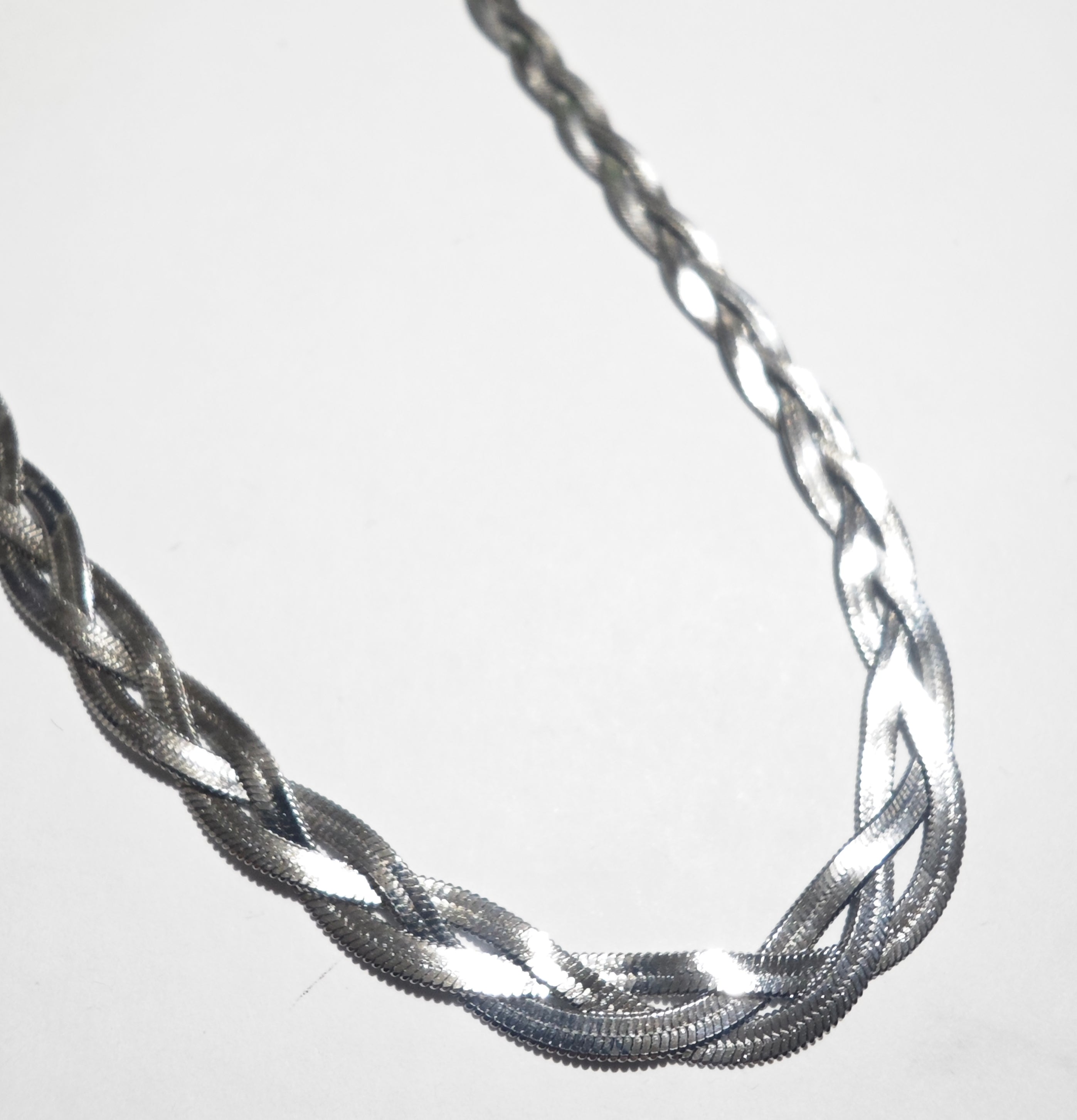 Collar planchado trenzado